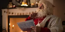 Santa Claus completing a Sudoku