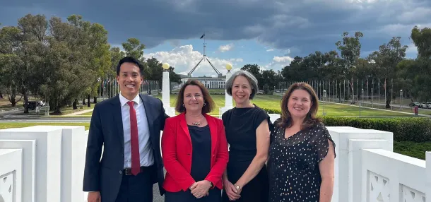 Photo of Aiden, Vanessa, Elayne, and Clare outside parliament house