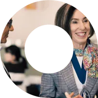 Actuaries celebrating together at an event within viewfinder cut-out