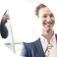 Two actuaries smiling at an event in a viewfinder shape