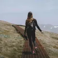 Woman walking on a path through Australian mountains