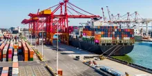 Elevated view container ship loading/unloading Port of Melbourne Swanson Dock container terminal.