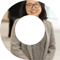 Actuary in grey suit smiling