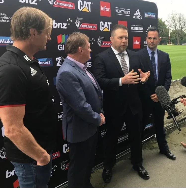 Douglas presenting Australasia's Best Sporting Team 2018 to the Crusaders in New Zealand with All Blacks coach Scott Robertson (left) and Ben Darwin (speaking) from GAIN LINE.