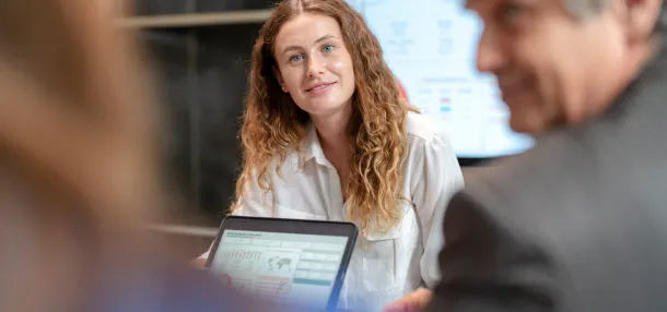 Co-workers working collaboratively.