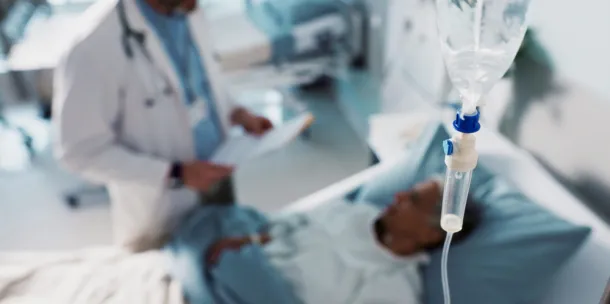 Doctor providing medical assistance to a patient