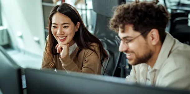 Colleagues working together at the office.