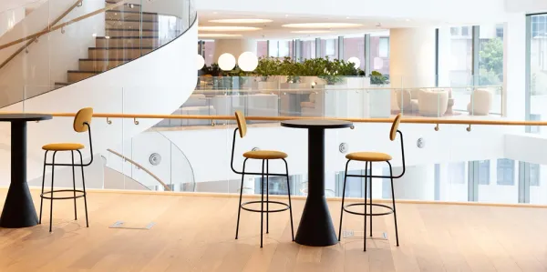 Chairs and a spiral staircase in a professional work building