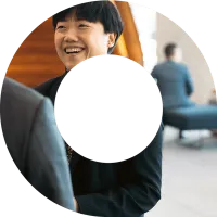 actuary laughing with a colleague