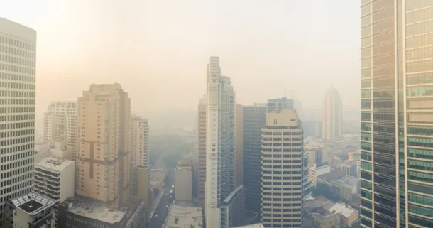 A shot of a hazy, smoky cityscape.