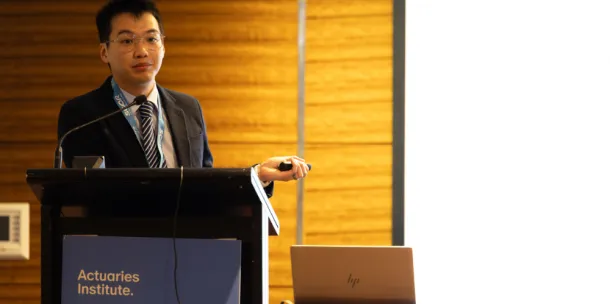 Garvin Tso presenting at the All Actuaries Summit 2025.