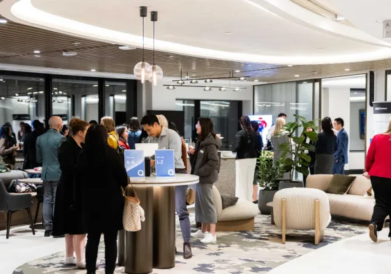 Room full of people networking.