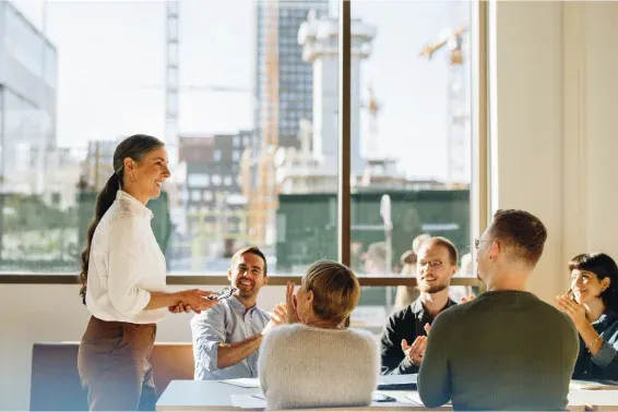 Woman addressing boardroom