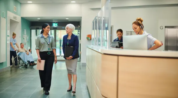 administrator with medical team