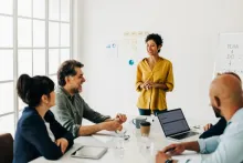 Diverse business people talking in a meeting. Business team having a discussion in a boardroom. Professionals work together to complete a project, sharing ideas and solutions.