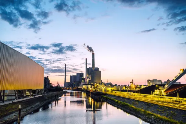 Dusk view of Germany's largest coal-fired power plant near Mannheim.
Large power station on the River Rhine at dusk.