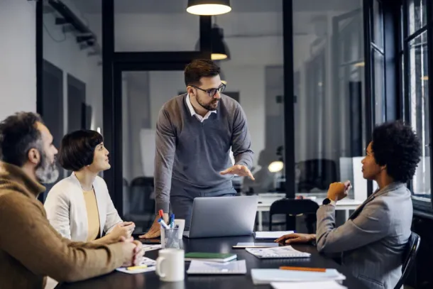 A conference where a team is receiving a presentation 